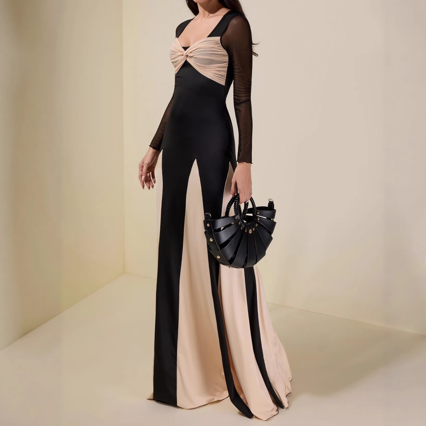 A long-sleeved women's dress with a fitted and elegant design, featuring a seamless and colorful blend